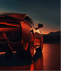 Red sports car at sunset